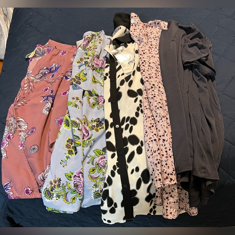 A bundle of 5 short sleeve or sleeveless shirts.